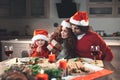 Happy family celebrating Christmas together at home Royalty Free Stock Photo