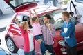 Happy family celebrating just bought a new car Royalty Free Stock Photo