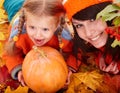 Happy family child autumn orange leaf, pumpkin