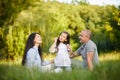 Happy family with child girl blow soap bubbles Royalty Free Stock Photo