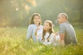 Happy family with child girl blow soap bubbles Royalty Free Stock Photo