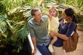 Happy family, child and pointing at zoo with tourist for sightseeing, travel or tour on trip. Father, mother and little Royalty Free Stock Photo