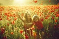 Happy family. child, small boy at mother or sister in poppy field Royalty Free Stock Photo