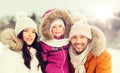 Happy family with child in winter clothes outdoors Royalty Free Stock Photo