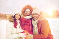 Happy family with child in winter clothes outdoors Royalty Free Stock Photo