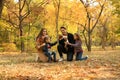 Happy family with children and dog in park Royalty Free Stock Photo