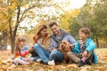 Happy family with children and dog in park Royalty Free Stock Photo