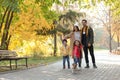 Happy family with children and dog in park Royalty Free Stock Photo