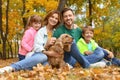 Happy family with children and dog in park Royalty Free Stock Photo