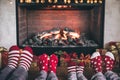 Happy family with children near fireplace at Christmas Royalty Free Stock Photo