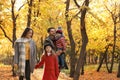 Happy family with children spending time together in park Royalty Free Stock Photo