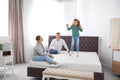 Family choosing mattress in furniture store Royalty Free Stock Photo