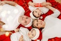 Happy family on Christmas eve. Cozy time at home. Togetherness concept Royalty Free Stock Photo