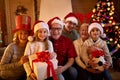 Happy family with Christmas gifts Royalty Free Stock Photo