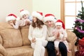 Happy family on Christmas in living room Royalty Free Stock Photo