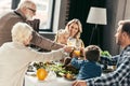 happy family clinking glasses