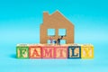 Happy family concept with miniature figurine