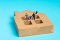 Happy family concept with miniature figurine