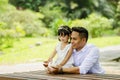 Young father spending time with his daughter at park during weekend Royalty Free Stock Photo