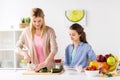 Happy family cooking dinner at home kitchen Royalty Free Stock Photo