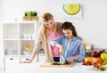 Happy family cooking dinner at home kitchen Royalty Free Stock Photo