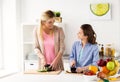 Happy family cooking dinner at home kitchen Royalty Free Stock Photo