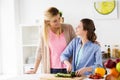 Happy family cooking dinner at home kitchen Royalty Free Stock Photo