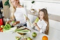 Happy family cooking healthy breakfast together home kitchen Royalty Free Stock Photo
