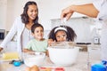 Happy family cooking, kitchen and learning development or quality time relationship bonding. Cheerful mom, dad teaching Royalty Free Stock Photo