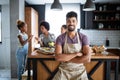 Happy family cooking together food in the kitchen Royalty Free Stock Photo