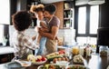 Happy family cooking together food in the kitchen Royalty Free Stock Photo