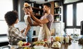 Happy family cooking together food in the kitchen Royalty Free Stock Photo