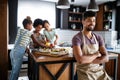 Happy family cooking together food in the kitchen Royalty Free Stock Photo