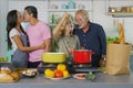 Happy family cooking together during lock down