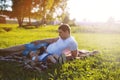 Happy family, dad and son resting in the evening at sunset Royalty Free Stock Photo