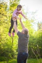 Happy family Dad throws daughter Royalty Free Stock Photo