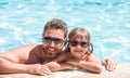 happy family of daddy and little boy having fun in summer swimming pool, family Royalty Free Stock Photo