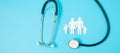Happy Family day. Stethoscope and paper shape cutout with Father, Mother, and Children. international day of families, Health, Royalty Free Stock Photo