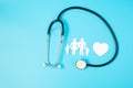 Happy Family day. Stethoscope and paper shape cutout with Father, Mother, and Children. international day of families, Health, Royalty Free Stock Photo