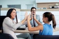 Happy family with the dealer buying a new car Royalty Free Stock Photo