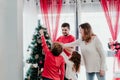 happy family decorating christmas tree at home Royalty Free Stock Photo