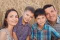 Happy family demonstrates toothy smile on ripe wheat field Royalty Free Stock Photo