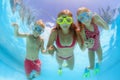 Happy family dive underwater with fun in swimming pool Royalty Free Stock Photo