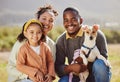 Happy family, dog and portrait and a park, relax and smile while bonding in nature, calm and cheerful. Happy, black Royalty Free Stock Photo