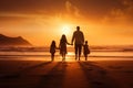 Happy family with dog walking on the beach at sunset. Concept of friendly family, Happy family on sandy beach near sea at sunset, Royalty Free Stock Photo