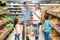 Happy family doing shopping Royalty Free Stock Photo