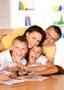 Happy family drawing with pencils Royalty Free Stock Photo