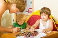 Happy family drawing with pencils Royalty Free Stock Photo