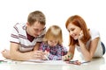 Happy family drawing picture. Royalty Free Stock Photo