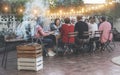 Happy family eating at barbecue party dinner - Different age of people having fun at bbq meal sitting in villa backyard - Summer Royalty Free Stock Photo